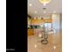 The kitchen features granite countertops, island sink, and cabinet space at 4548 E Nightingale Ln, Gilbert, AZ 85298