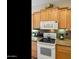The kitchen showcases modern appliances and granite countertops with decorative touches at 4548 E Nightingale Ln, Gilbert, AZ 85298