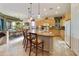 Bright kitchen features modern appliances, granite countertops, and a seamless flow to dining area at 4548 E Nightingale Ln, Gilbert, AZ 85298