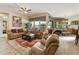 Cozy living room showcasing comfortable seating, and open floorplan at 4548 E Nightingale Ln, Gilbert, AZ 85298
