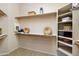 Walk-in closet offering ample storage with shelving, rods, and a neutral color palette at 4548 E Nightingale Ln, Gilbert, AZ 85298