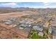 A high-angle shot revealing a neighborhood set against a mountainous backdrop and desert terrain at 460 W Chase St, San Tan Valley, AZ 85143