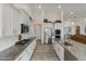 Modern kitchen features stainless steel appliances, granite countertops, and ample cabinet space at 460 W Chase St, San Tan Valley, AZ 85143