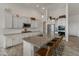 Modern kitchen with a large island, granite countertops, stainless steel appliances, and ample cabinet space at 460 W Chase St, San Tan Valley, AZ 85143