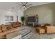 Relaxing living room features a cozy seating arrangement and a neutral color palette at 460 W Chase St, San Tan Valley, AZ 85143