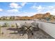 Inviting outdoor patio area featuring comfortable seating and mountain views at 460 W Chase St, San Tan Valley, AZ 85143