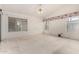 Spacious bedroom with natural light from multiple windows and sliding glass door at 462 N Bedford Ct, Chandler, AZ 85225