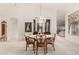 Formal dining room features a decorative chandelier and built-in china cabinet at 462 N Bedford Ct, Chandler, AZ 85225