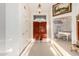 Bright foyer showcasing a chandelier, tile floor, a closet door, and views into the formal living at 462 N Bedford Ct, Chandler, AZ 85225