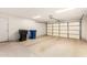 Spacious garage with ample storage and a functional door for easy access at 462 N Bedford Ct, Chandler, AZ 85225