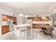 Open kitchen design features island seating and connects to the dining area at 462 N Bedford Ct, Chandler, AZ 85225