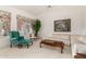 Cozy living room features plush seating, large windows, and decorative tree at 462 N Bedford Ct, Chandler, AZ 85225