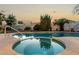 Sparkling pool and spa area with desert landscaping, perfect for relaxing and entertaining at 462 N Bedford Ct, Chandler, AZ 85225