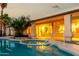 Beautiful pool area with a spa and covered patio, ideal for relaxing and enjoying the outdoors at 462 N Bedford Ct, Chandler, AZ 85225