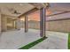 Covered backyard patio with decorative pavers and minimal green space, ideal for outdoor entertaining at 550 E Zion Pl, Chandler, AZ 85249