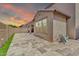 Backyard showcasing a paved patio, minimal grass, and exterior stucco walls for low maintenance landscaping at 550 E Zion Pl, Chandler, AZ 85249