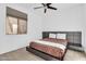 Modern bedroom featuring a sleek, dark headboard and a neutral color palette for a calming atmosphere at 550 E Zion Pl, Chandler, AZ 85249