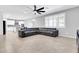 Open-concept living room with a ceiling fan and lots of natural light at 550 E Zion Pl, Chandler, AZ 85249
