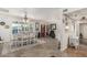 Inviting dining area with hardwood floors, neutral color scheme, and backyard views at 6247 E Albany St, Mesa, AZ 85205
