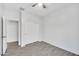 This bedroom offers a large closet and doorway with tile flooring, perfect for relaxation at 7207 W Alta Vista Rd, Laveen, AZ 85339