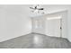 Bedroom with ample natural light, tile flooring, and a ceiling fan for added comfort at 7207 W Alta Vista Rd, Laveen, AZ 85339