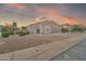 Inviting single-story home with desert landscaping and a cozy front entry at 7207 W Alta Vista Rd, Laveen, AZ 85339