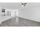 Bright living room featuring tile flooring, a ceiling fan, and neutral paint throughout at 7207 W Alta Vista Rd, Laveen, AZ 85339