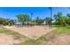 Community volleyball court offering a sandy playing surface for recreational fun and exercise at 7826 W Mcrae Way, Glendale, AZ 85308