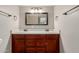 Bathroom with double sinks, a large mirror, updated vanity, and modern fixtures at 8103 E Southern #303 Ave, Mesa, AZ 85209