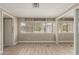 This bedroom features wood-look floors and a mirrored closet at 8103 E Southern #303 Ave, Mesa, AZ 85209