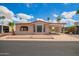 Attractive home showcasing manicured landscaping and convenient carport in a vibrant community at 8103 E Southern #303 Ave, Mesa, AZ 85209