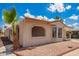 Charming home with unique architectural details, easy landscaping, and convenient carport, inviting and practical at 8103 E Southern #303 Ave, Mesa, AZ 85209