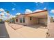 Attractive home featuring low maintenance landscaping and convenient carport on a sunny day at 8103 E Southern #303 Ave, Mesa, AZ 85209