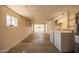 Long, narrow garage equipped with a laundry area, a water heater and plenty of storage space at 8103 E Southern #303 Ave, Mesa, AZ 85209
