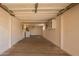 Interior shot of a garage features a laundry area and plenty of storage space at 8103 E Southern #303 Ave, Mesa, AZ 85209