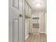 Hallway features neutral paint, closet, and leads to the main living spaces at 8103 E Southern #303 Ave, Mesa, AZ 85209