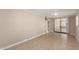 Living room features tile flooring and access to the outside patio at 8103 E Southern #303 Ave, Mesa, AZ 85209