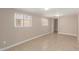 Living room with tile flooring and two windows that let in natural light at 8103 E Southern #303 Ave, Mesa, AZ 85209