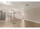 Open-concept living room with ceiling fan flows into the adjacent kitchen at 8103 E Southern #303 Ave, Mesa, AZ 85209
