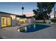 Enjoy the backyard oasis with a private pool and a seamless transition to the indoors at 8403 E Fairmount Ave, Scottsdale, AZ 85251