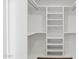 Bright, organized closet featuring built-in shelving and ample storage space at 8403 E Fairmount Ave, Scottsdale, AZ 85251