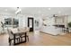Open-concept living and dining area bathed in natural light, perfect for entertaining and Gathering gatherings at 8403 E Fairmount Ave, Scottsdale, AZ 85251
