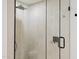 Bright walk-in shower featuring glass doors and sleek fixtures at 8403 E Fairmount Ave, Scottsdale, AZ 85251
