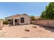 Beautiful backyard featuring desert landscaping, patio, and privacy fence at 8628 W Maui Ln, Peoria, AZ 85381