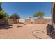 Backyard featuring desert landscaping, block wall, with plants adding color at 8628 W Maui Ln, Peoria, AZ 85381