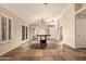 Spacious living room featuring tile flooring, neutral paint, and ample natural light at 8628 W Maui Ln, Peoria, AZ 85381