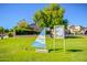 Community Private Lake property no trespassing sign on green grass at 8628 W Maui Ln, Peoria, AZ 85381