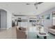 Stylish open-concept kitchen with modern appliances and a dining area perfect for Gathering meals and entertaining guests at 8750 W Granada Rd, Phoenix, AZ 85037