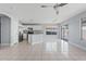 Modern kitchen features stainless steel appliances, granite countertops, and ample cabinet space, perfect for cooking at 8750 W Granada Rd, Phoenix, AZ 85037