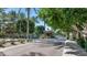 Gated community entrance with lush landscaping, offering security and a welcoming atmosphere at 8760 N 73Rd Way, Scottsdale, AZ 85258